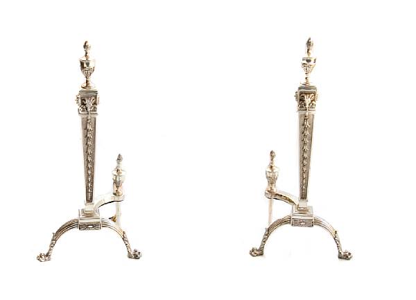 Appraisal: A pair of George III style silvered andirons and tools