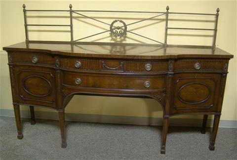 Appraisal: LARGE HEPPLEWHITE STYLE MAHOGANY SIDEBOARD the top with scrolling front