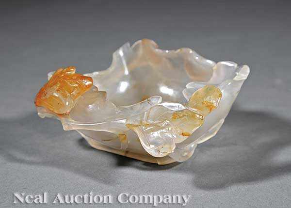 Appraisal: A Chinese Agate Brushwasher th c translucent smoky white stone