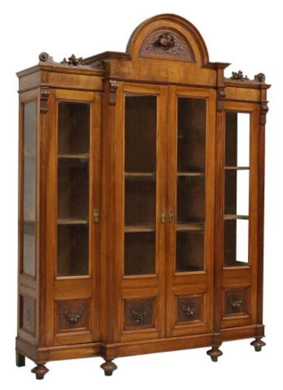 Appraisal: Italian carved breakfront bookcase th c having molded crest with