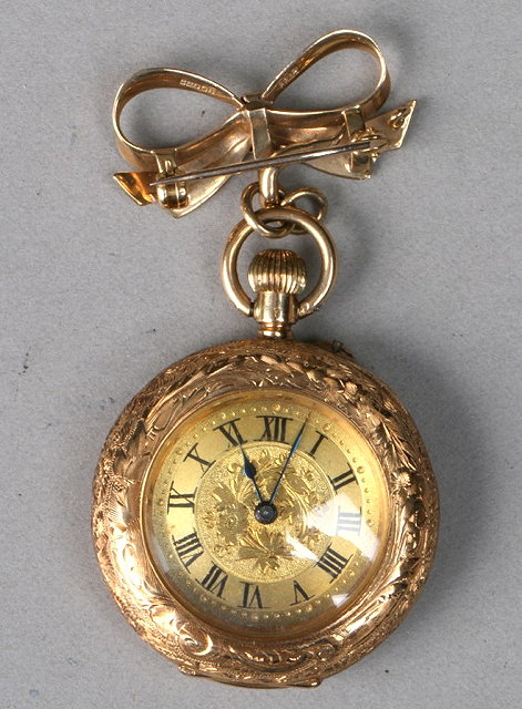 Appraisal: A LADIES K POCKET WATCH with gilt dial Roman numerals