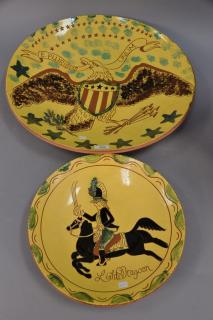 Appraisal: Two Breininger redware pottery chargers including light dragon design dia