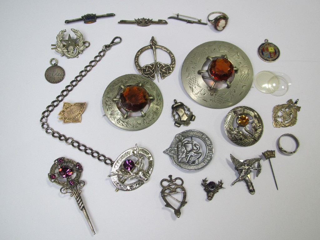 Appraisal: Lot of silver and white metal brooches to include stone