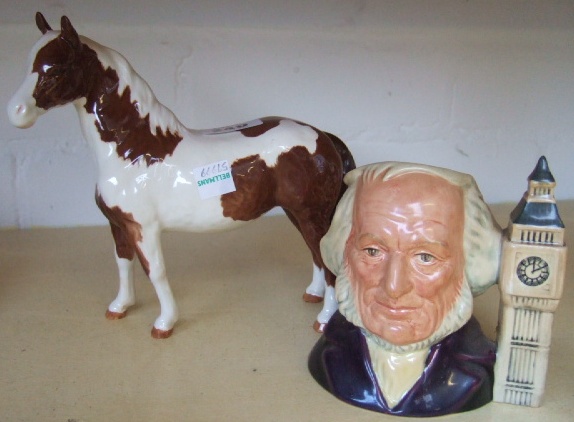 Appraisal: A Beswick scewbald horse and a Royal Doulton character jug