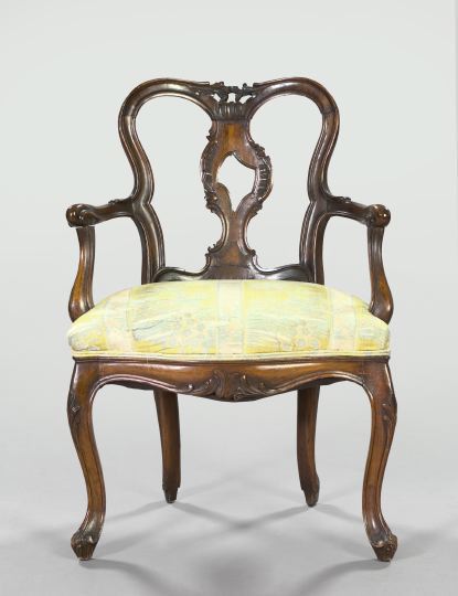 Appraisal: Provincial Louis XV Walnut-Stained Armchair the molded crest rail centered