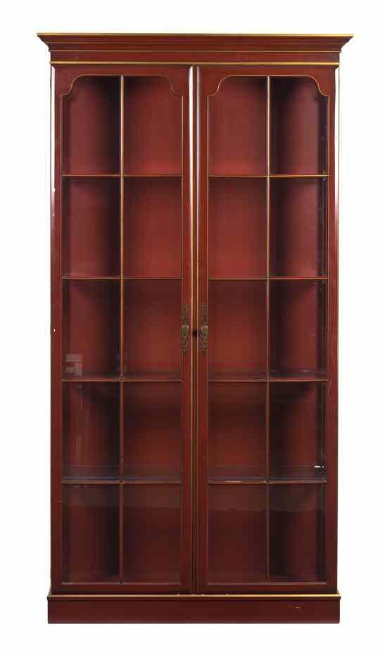 Appraisal: An American Lacquered Vitrine having a stepped cornice over two