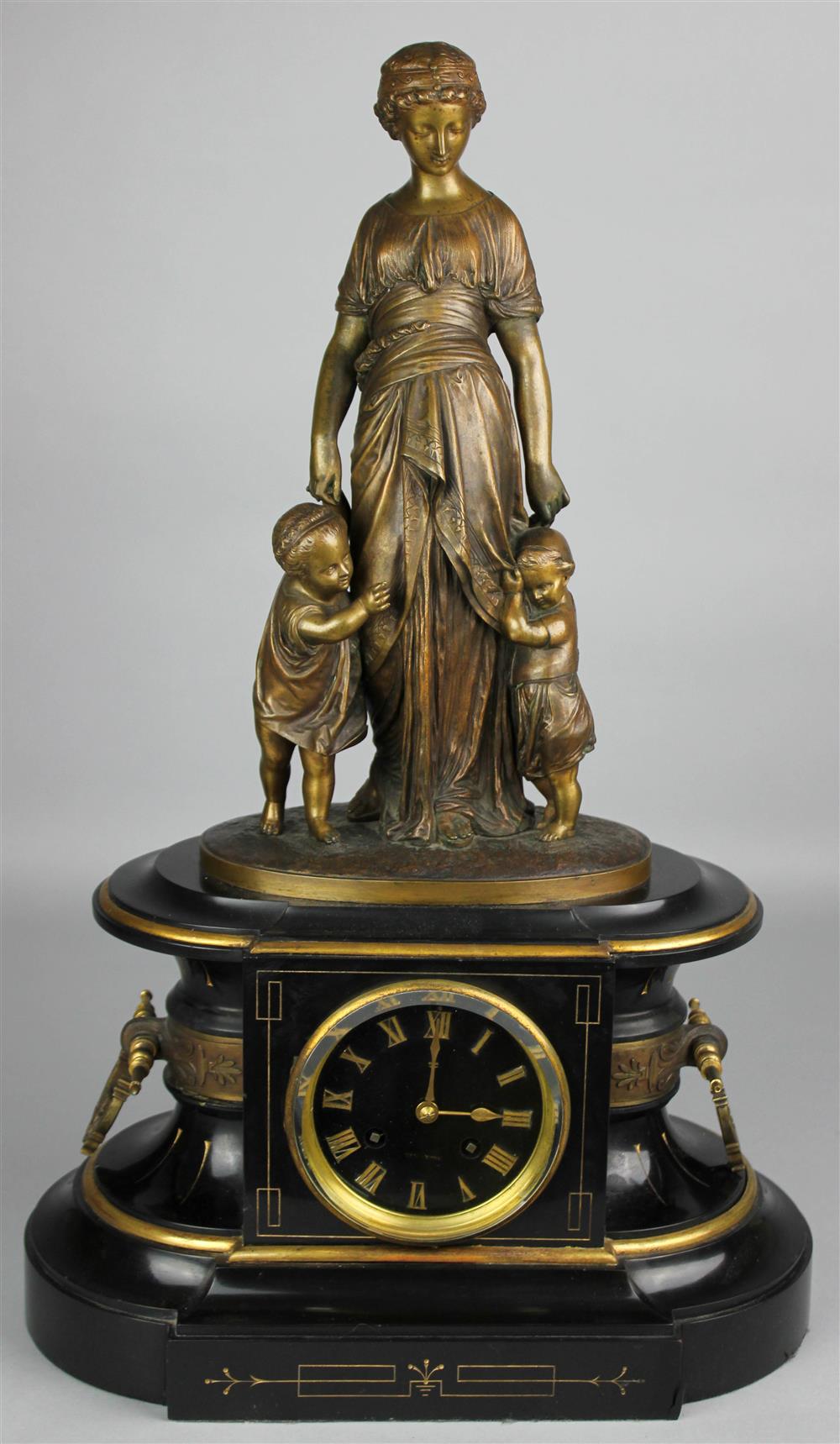 Appraisal: FRENCH NEO-GREC ORMOLU MOUNTED FIGURAL BLACK MARBLE MANTEL CLOCK BY