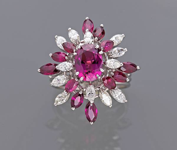 Appraisal: A ruby and diamond ring central ruby weighing approximately carats