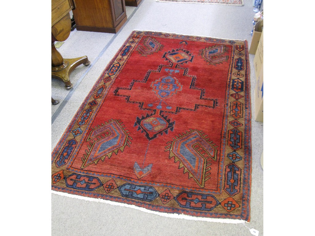 Appraisal: Eastern rug with red ground