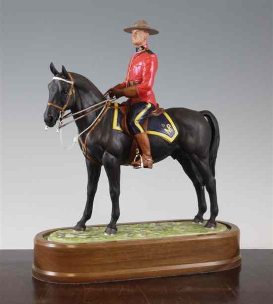 Appraisal: A Royal Worcester group 'Royal Canadian Mounted Policeman' by Doris