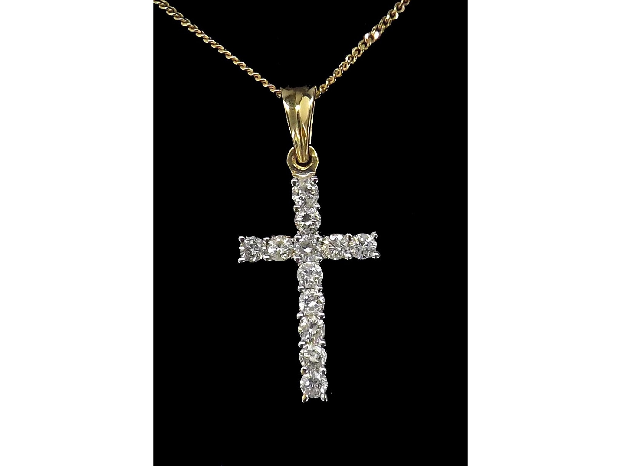 Appraisal: ct diamond cross pendant on a slender necklet round brilliant-cut