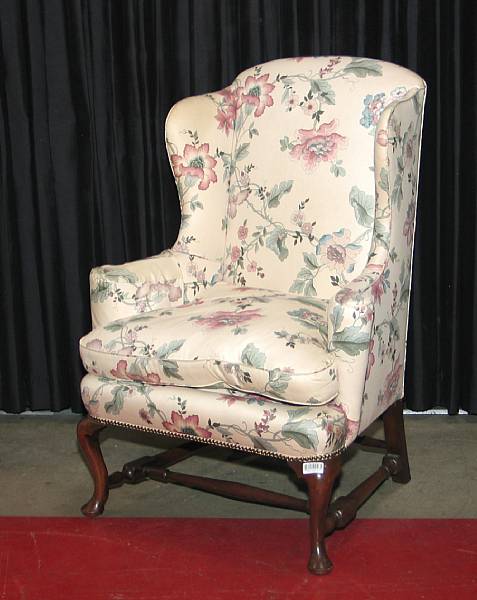 Appraisal: A Queen Anne style walnut wing chair mid th century