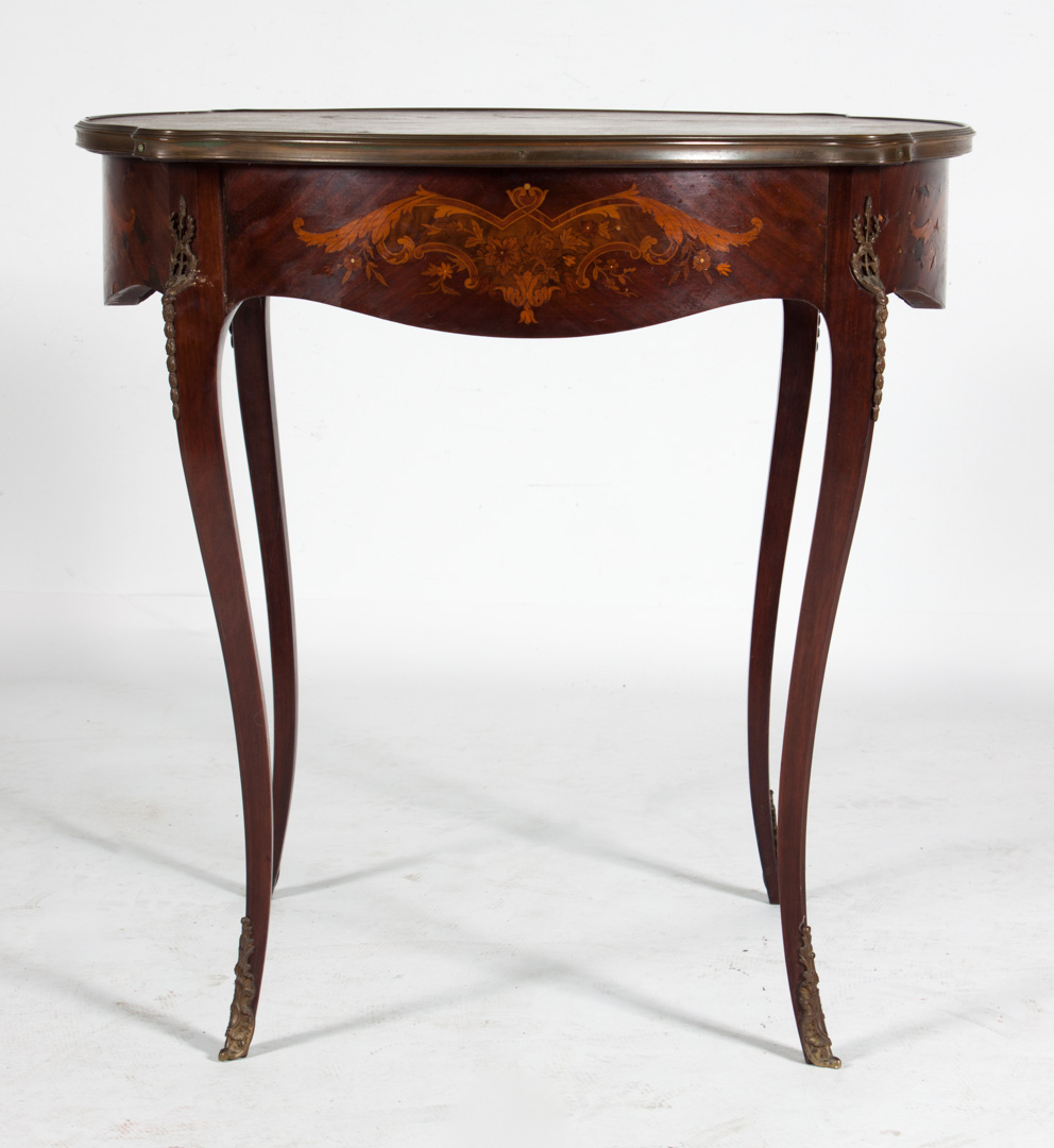 Appraisal: Edwardian marquetry inlaid mahogany side table late th century round