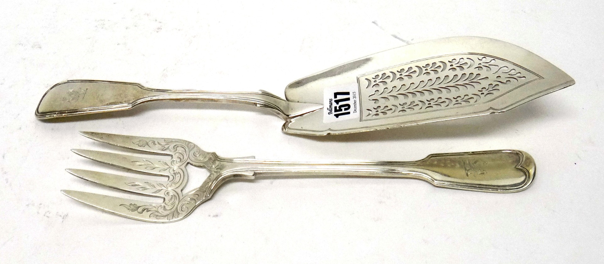 Appraisal: A silver fiddle and thread pattern fish slice London and