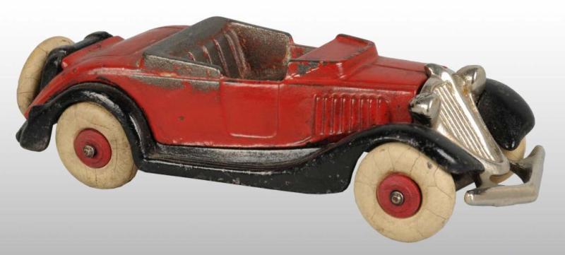 Appraisal: Cast Iron Convertible Toy Description Includes a spare tire and