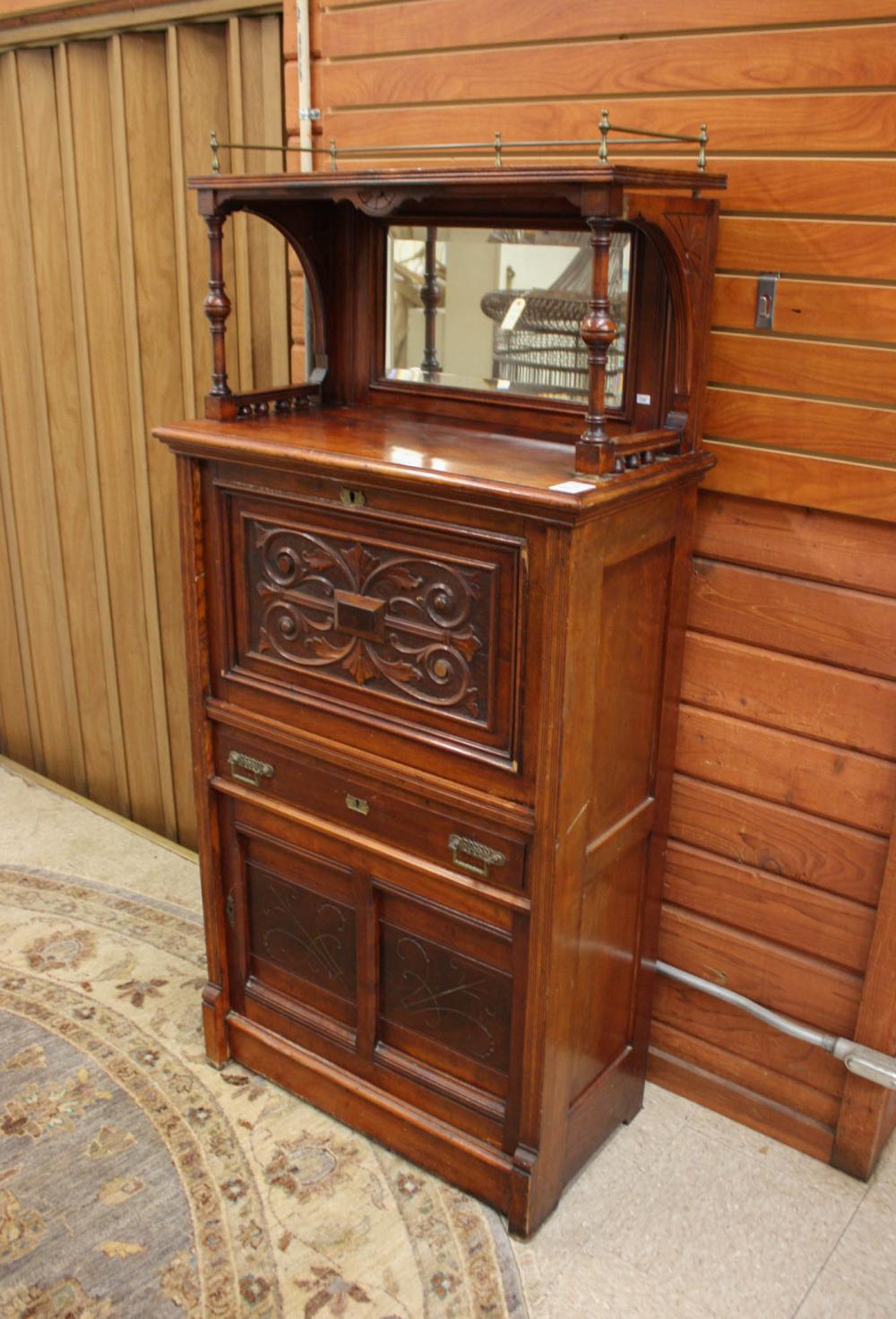 Appraisal: VICTORIAN DROP-FRONT SECRETARY American th century cherry finish with relief