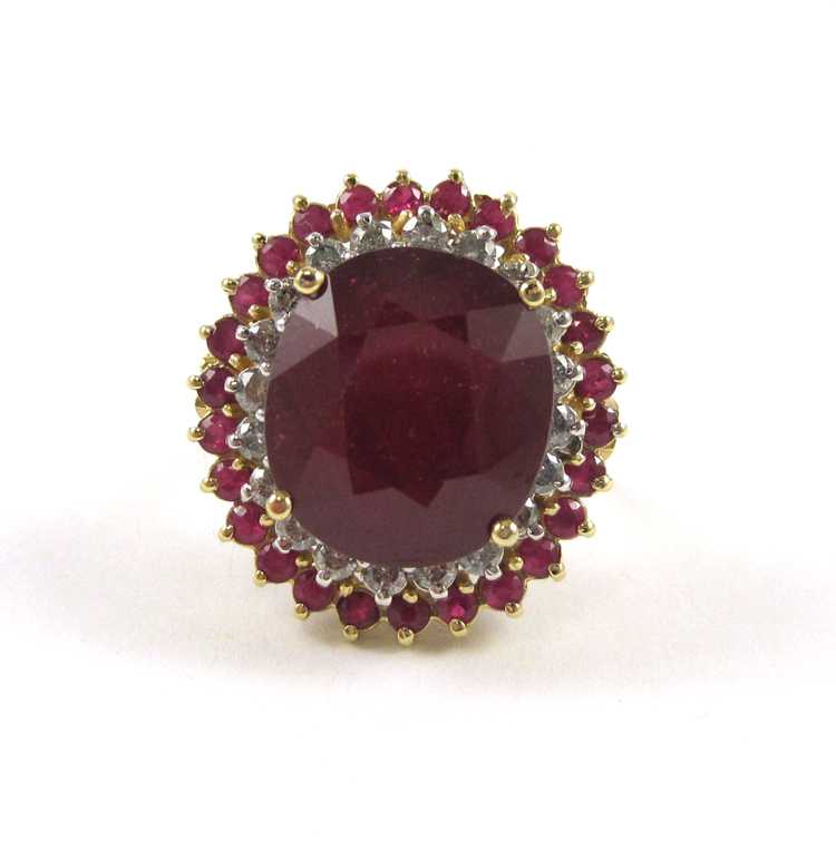 Appraisal: RUBY DIAMOND AND FOURTEEN KARAT GOLD RING with round-cut rubies