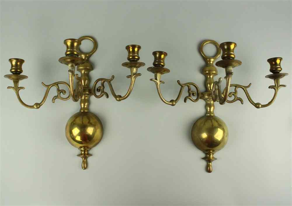 Appraisal: PAIR OF GEORGE II STYLE BRASS WALL LIGHTS each with