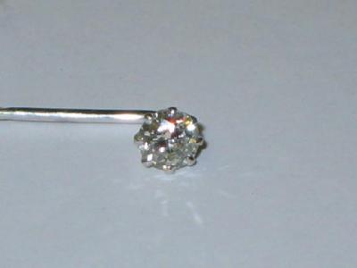 Appraisal: A DIAMOND STICK PIN the brilliant cut stone approximately cts