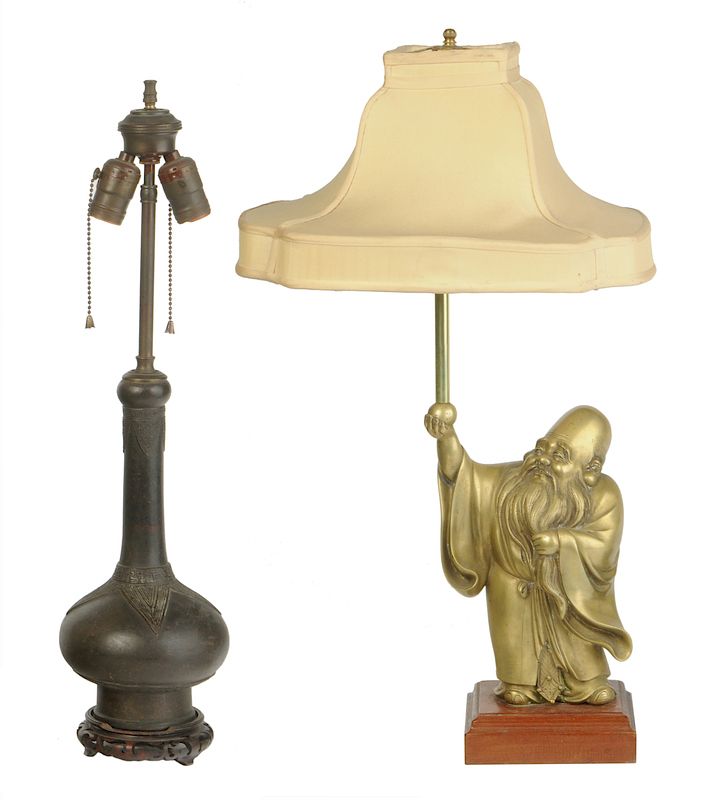 Appraisal: Two Asian Brass and Bronze Lamps th th century one