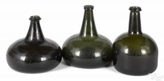 Appraisal: Two blown olive glass squat bottles th c '' h