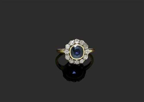 Appraisal: SAPPHIRE AND DIAMOND RING ca Silver and yellow gold Classic