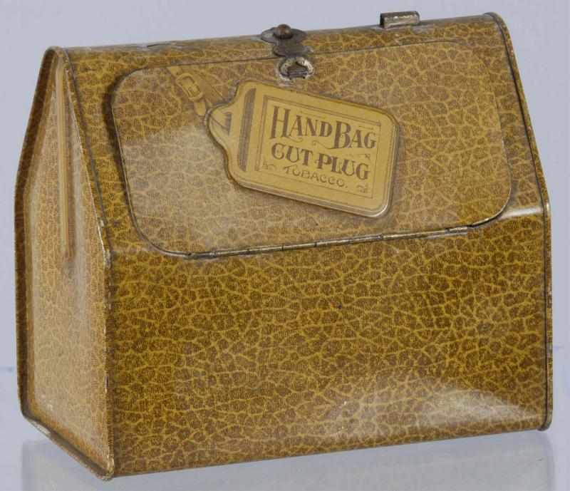 Appraisal: Hand Bag Tobacco Lunch Box Tin Description Missing handle on