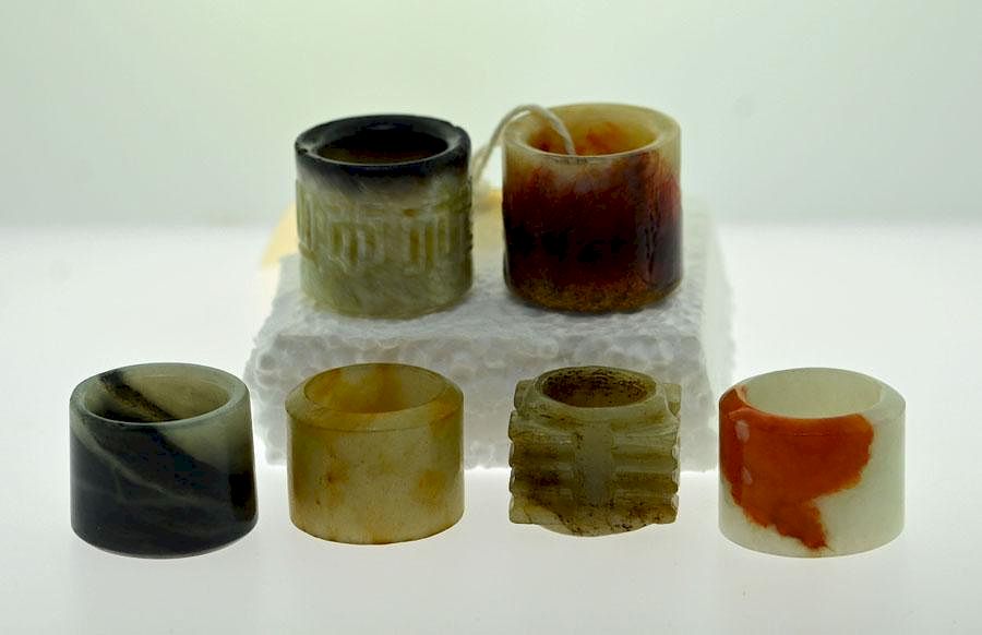 Appraisal: Chinese Thumb Rings Six Chinese jade thumb rings three are