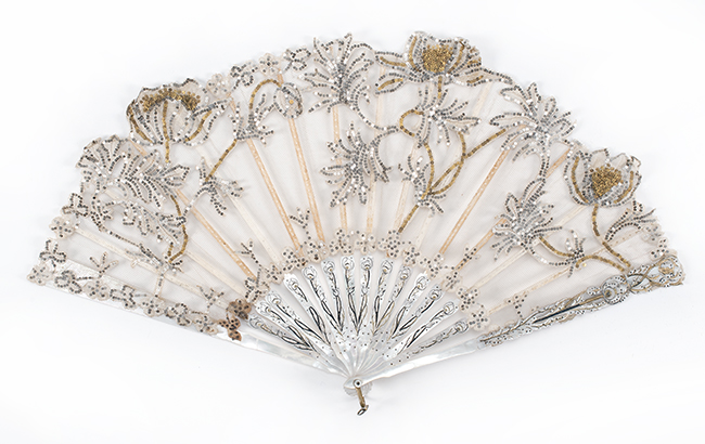 Appraisal: EMBROIDERED SEQUINED AND MOTHER-OF-PEARL FOLDING FAN Early th CenturySilver and