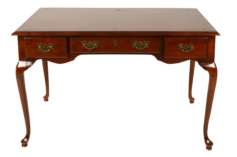 Appraisal: AMERICAN DREW MAHOGANY WRITING TABLEmanufacturer's stamp to drawer interior in