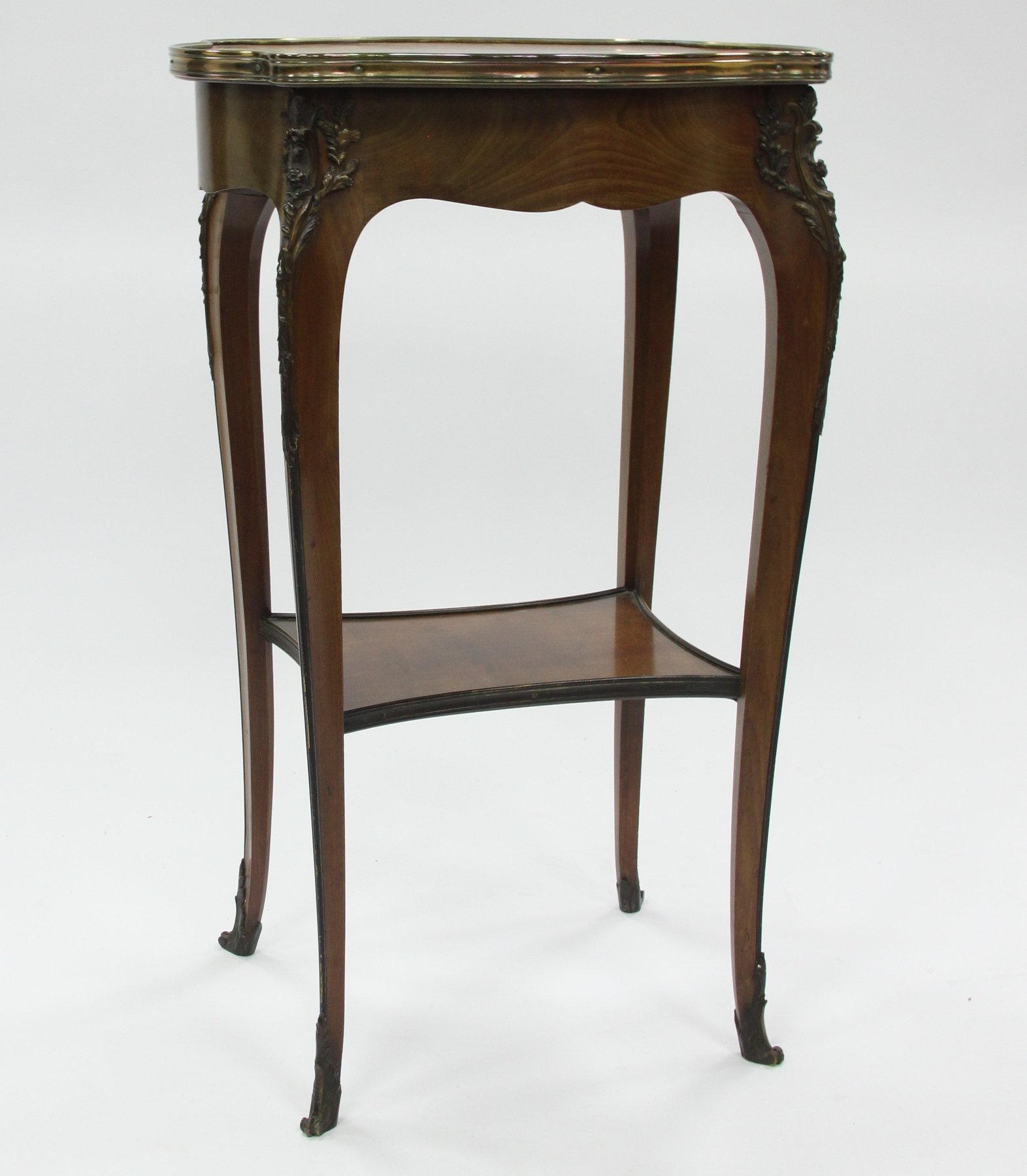 Appraisal: A mahogany jardiniere stand of Louis XVI design gilt metal