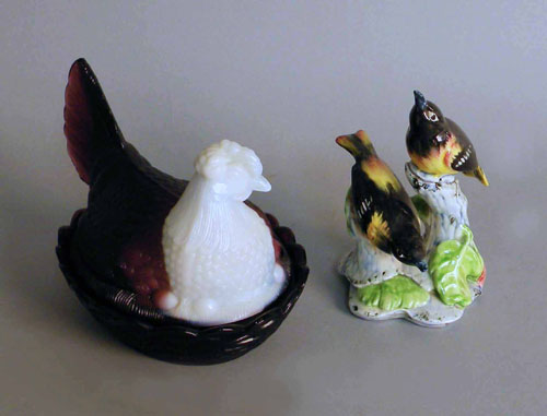 Appraisal: An amethyst and milk glass hen on nest h together