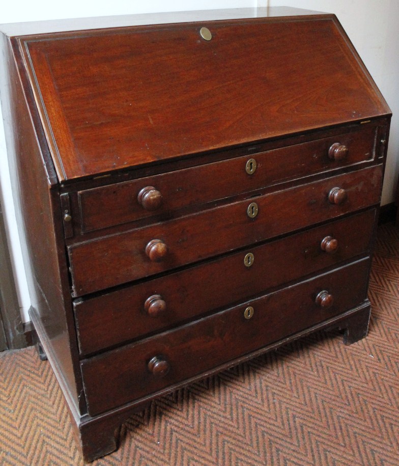 Appraisal: An thC mahogany bureau the fall front with an enclosed