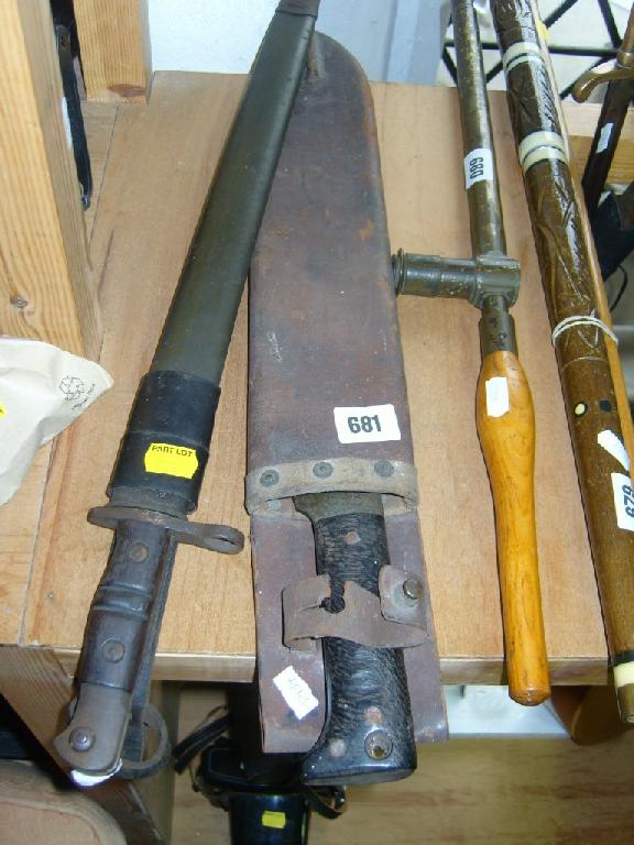 Appraisal: A USA model Remington bayonet and scabbard and an American