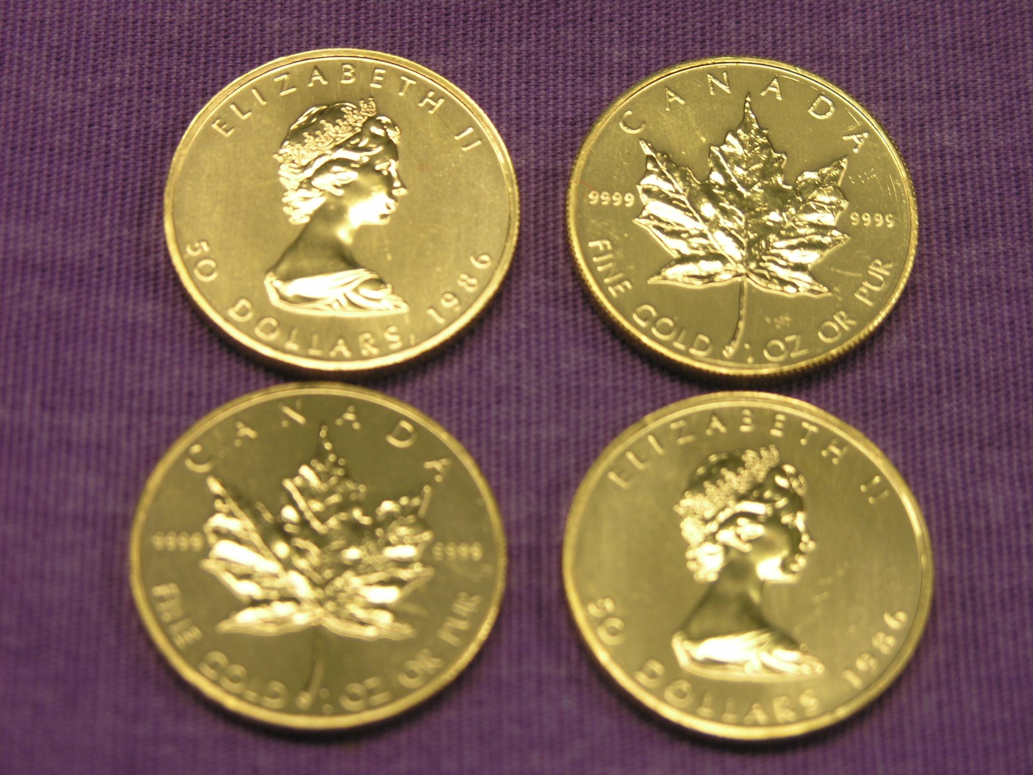 Appraisal: Four Canadian Dollars gold coins