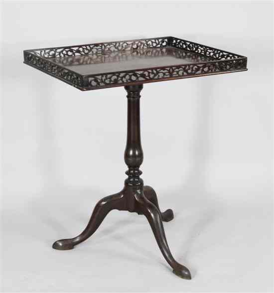 Appraisal: A George II mahogany tripod table c the oblong top