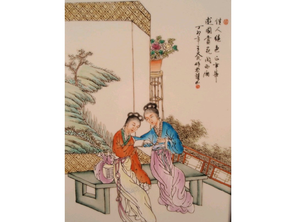 Appraisal: A Chinese painted porcelain panel depicting two ladies seated on