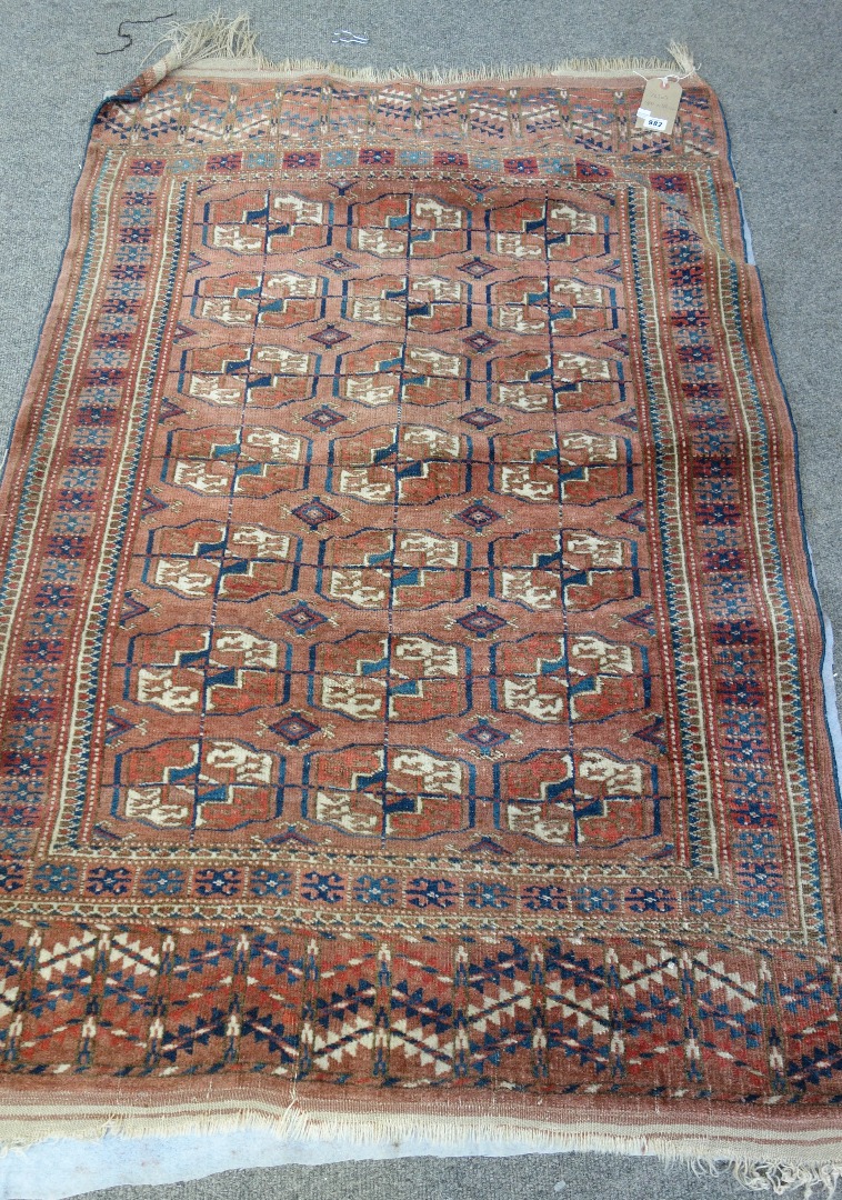 Appraisal: A Tekke Turkman rug the madder field with three columns