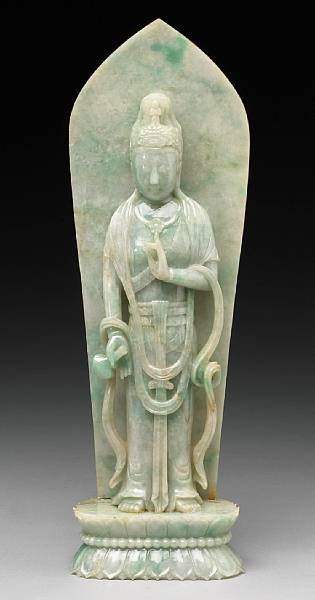 Appraisal: A mottled green jadeite figure of Guanyin on a lotus