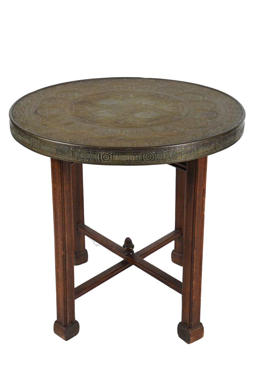 Appraisal: ROUND BRASS TRAY TOP STANDon a wooden base Condition edge