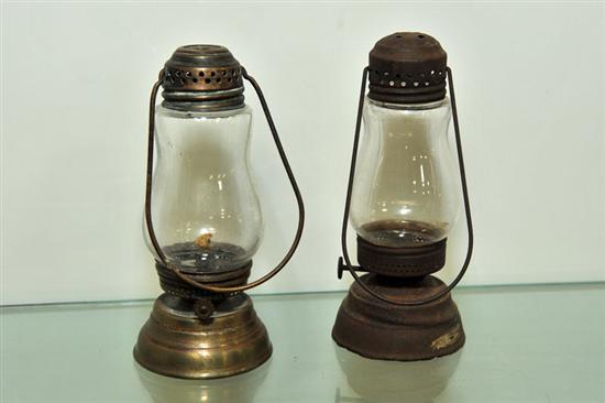 Appraisal: TWO SKATER'S LANTERNS Both clear glass with wire handles ''