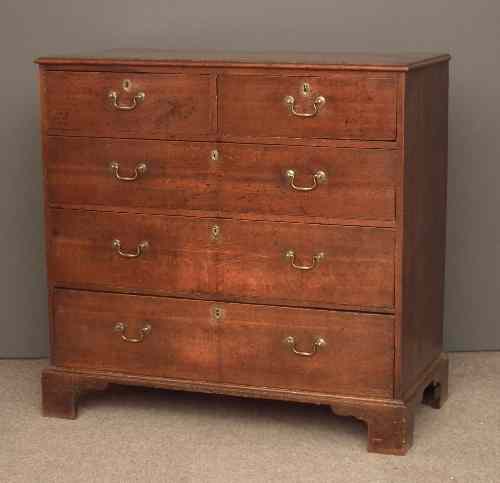 Appraisal: A George III oak chest of drawers the top with