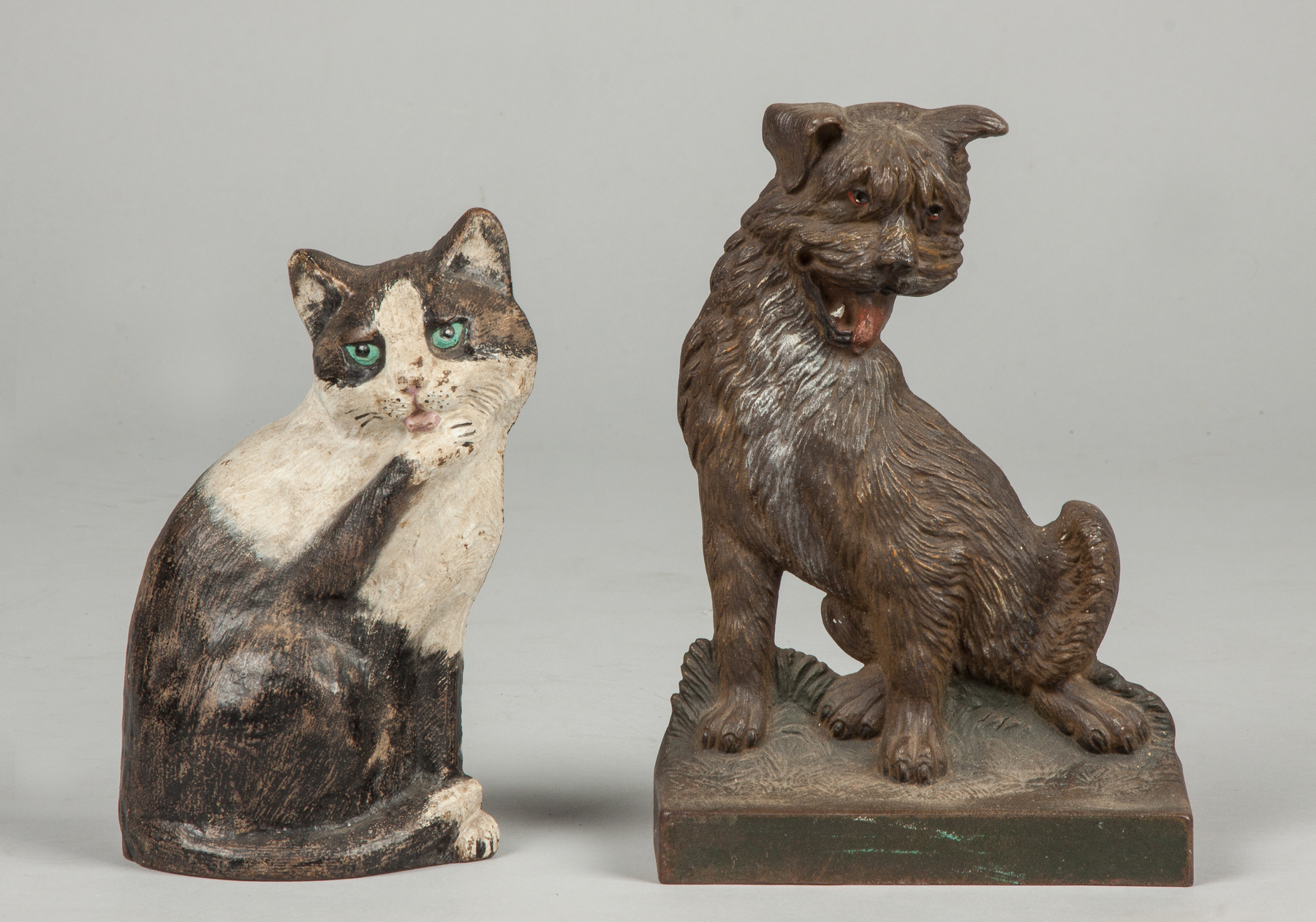 Appraisal: Two Vintage Cast Iron Door Stops Waverly Bradley Hubbard Cat