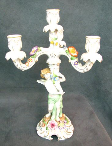 Appraisal: Pair of ornate German porcelain -branch figural candlesticks one arm