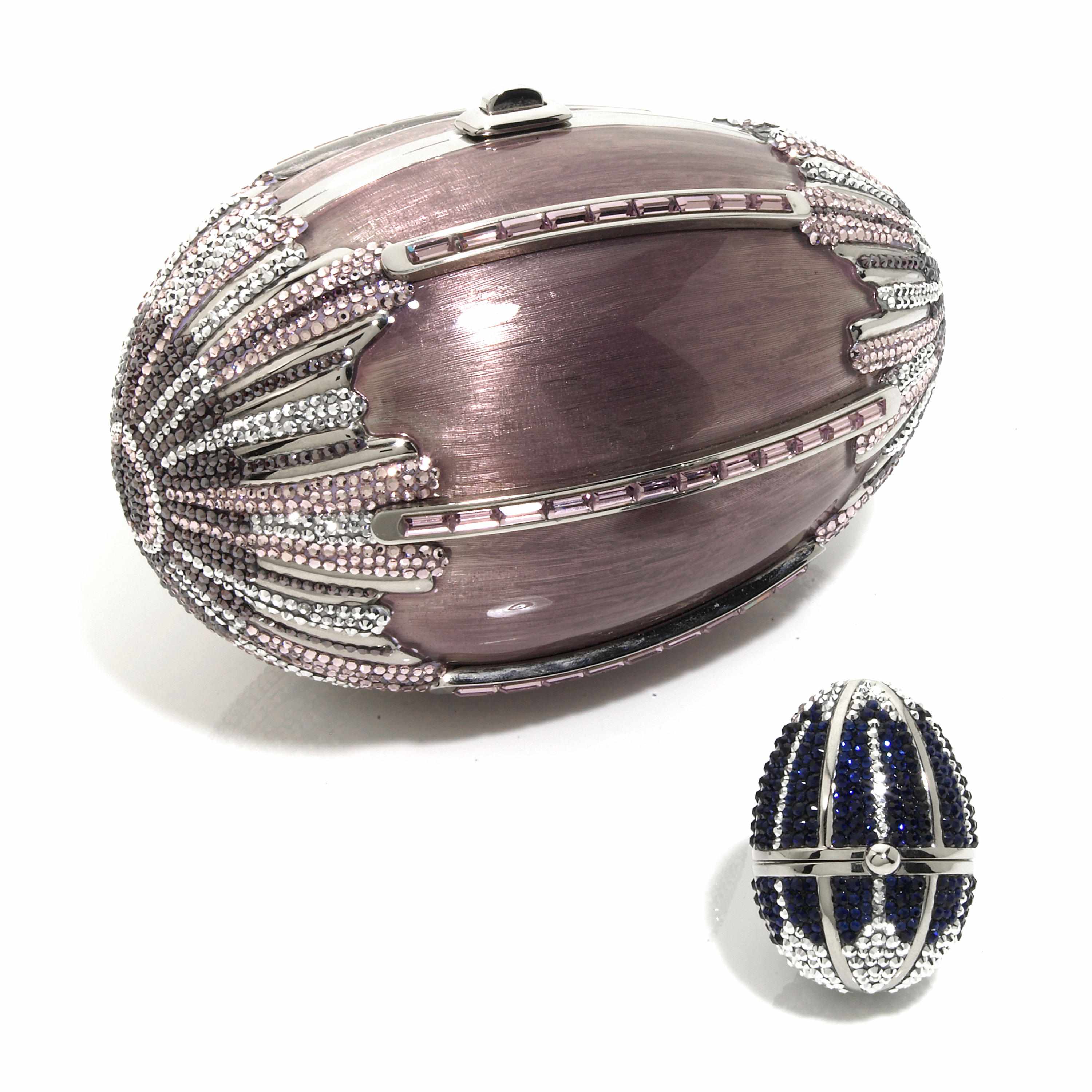 Appraisal: A metal pink and silver crystal egg purse together with