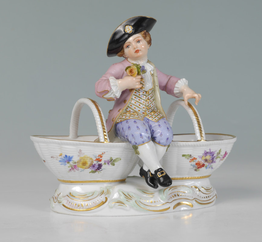 Appraisal: MEISSEN FIGURAL SALT CELLAR Figure of a seated boy holding