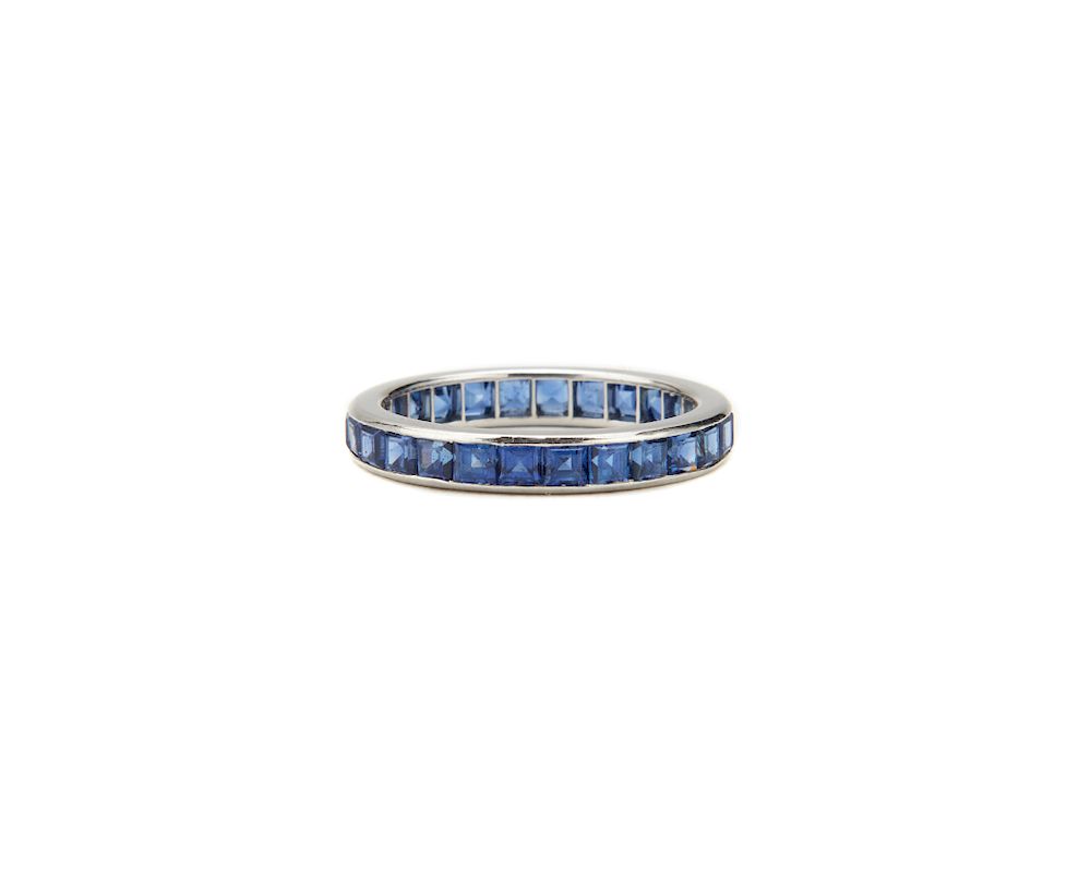 Appraisal: Platinum and Sapphire Band Platinum and Sapphire Band channel-set with