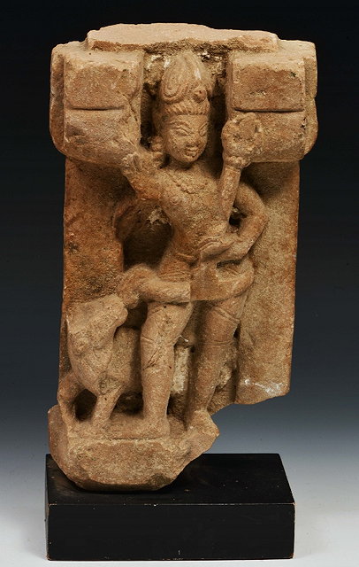 Appraisal: AN INDIAN SAND STONE CARVED FRAGMENTARY FIGURE of a standing