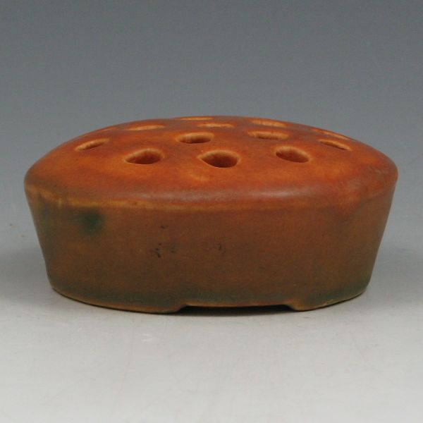 Appraisal: Roseville - flower frog in brown glaze to match the