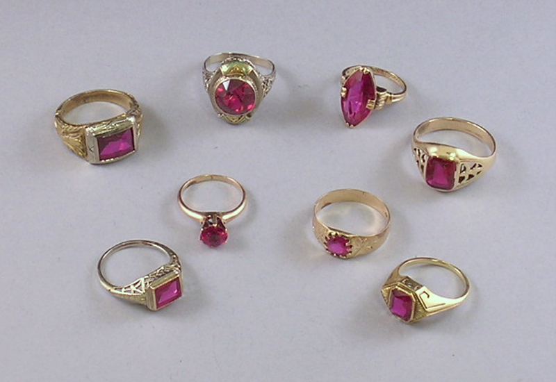 Appraisal: Eight Gold and Red Gemstone Rings five in kt gold